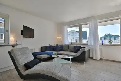 Ein Sitzbereich in der Unterkunft Haus Oceanfront, Appartement 11