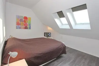 Ein Bett oder Betten in einem Zimmer der Unterkunft Haus am Hörn LOUISE Appartement 8