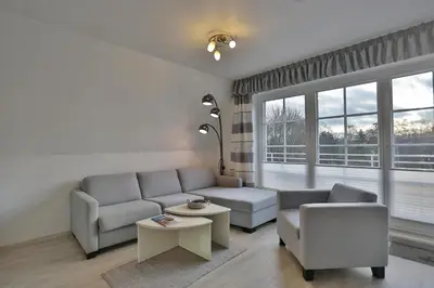 Ein Sitzbereich in der Unterkunft Haus Parkblick Parkblick Appartement 12