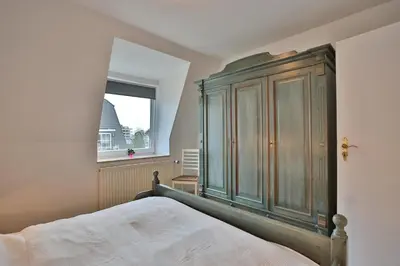 Ein Bett oder Betten in einem Zimmer der Unterkunft Haus Parkblick Parkblick Appartement 12