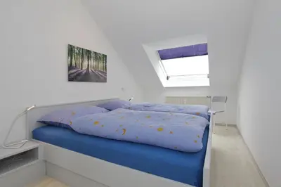 Ein Bett oder Betten in einem Zimmer der Unterkunft Residenz Ostseestrand Appartement 25