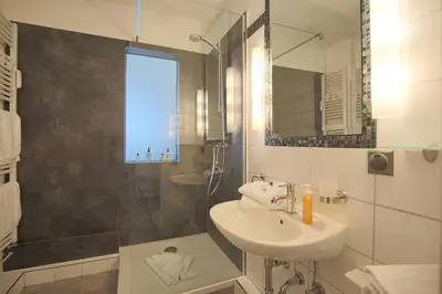 Ein Badezimmer in der Unterkunft Haus Sonnenschein Haus Sonnenschein Appartement 7 Strandnest
