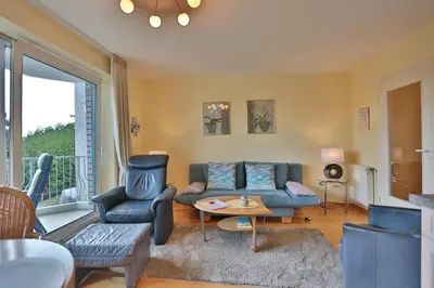 Ein Sitzbereich in der Unterkunft Strandschlößchen Strandschlösschen Appartement 24