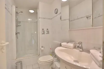 Ein Badezimmer in der Unterkunft Strandschlößchen Strandschlösschen Appartement 24