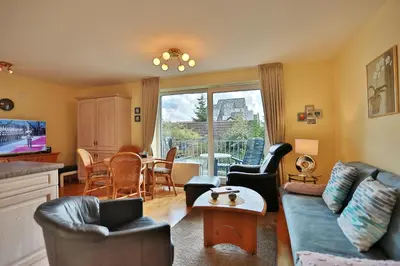 Ein Sitzbereich in der Unterkunft Strandschlößchen Strandschlösschen Appartement 24
