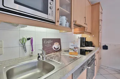 Küche/Küchenzeile in der Unterkunft Residenz Alte Bergstraße Residenz Alte Bergstrasse Appartement 9