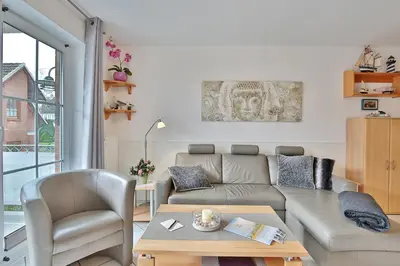 Ein Sitzbereich in der Unterkunft Residenz Alte Bergstraße Residenz Alte Bergstrasse Appartement 9