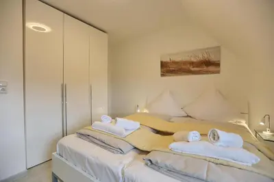 Ein Bett oder Betten in einem Zimmer der Unterkunft Residenz Strandnah Residenz Strandnah Appartement 2