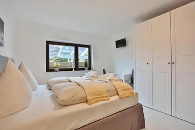 Ein Bett oder Betten in einem Zimmer der Unterkunft Residenz Strandnah Residenz Strandnah Appartement 3