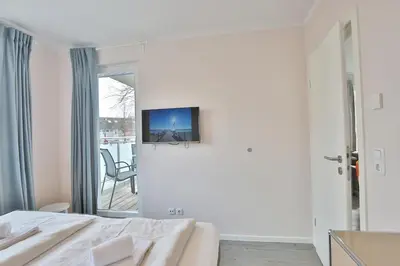 TV/Unterhaltungsangebot in der Unterkunft Strandvilla Augustusbad Strandvilla Augustusbad Appartement Riverside