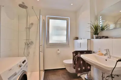 Ein Badezimmer in der Unterkunft Haus Möwenberg 14 Haus Möwenberg Appartement 1