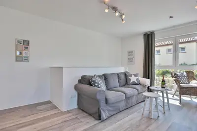 Ein Sitzbereich in der Unterkunft Haus Möwenberg 14 Haus Möwenberg Appartement 1