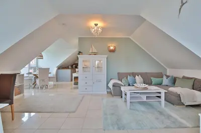 Ein Sitzbereich in der Unterkunft Domizil am Eschenweg 5 Domizil am Eschenweg 5 Appartement Ostseerauschen