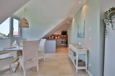 Ein Sitzbereich in der Unterkunft Domizil am Eschenweg 5 Domizil am Eschenweg 5 Appartement Ostseerauschen
