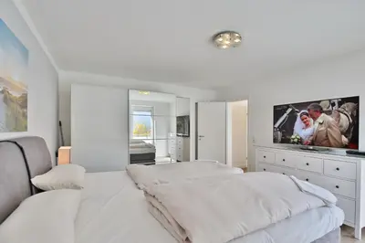 Ein Bett oder Betten in einem Zimmer der Unterkunft Appartemenhaus Linda-Lu Appartementhaus Linda-Lu Appartement 1