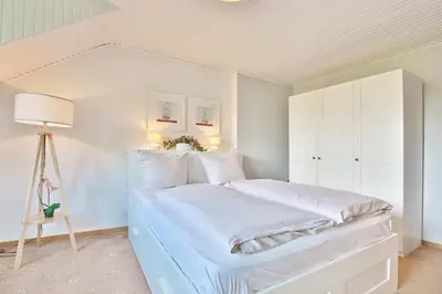 Ein Bett oder Betten in einem Zimmer der Unterkunft Appartemenhaus Linda-Lu Appartementhaus Linda-Lu Appartement 7