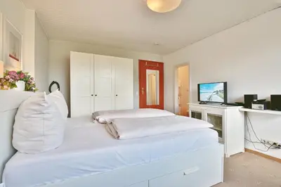 Ein Bett oder Betten in einem Zimmer der Unterkunft Appartemenhaus Linda-Lu Appartementhaus Linda-Lu Appartement 7