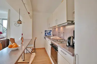 Küche/Küchenzeile in der Unterkunft Strandschlößchen Strandschlösschen Appartement 1