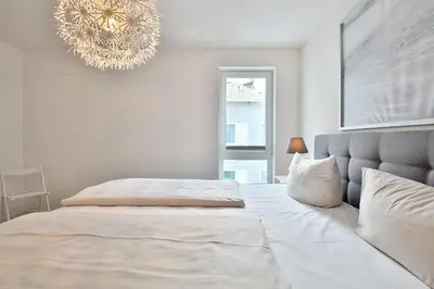 Ein Bett oder Betten in einem Zimmer der Unterkunft Haus Meeresbrise Haus Meeresbrise Appartement 16