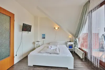 Ein Bett oder Betten in einem Zimmer der Unterkunft Seeburg Seeburg Appartement 27