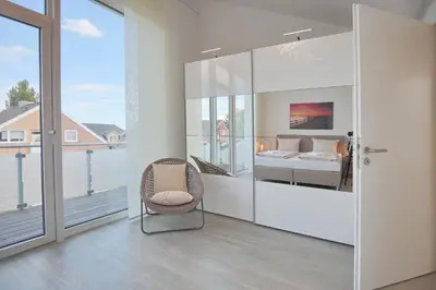 Ein Bett oder Betten in einem Zimmer der Unterkunft Logenplatz am Kammerweg Logenplatz am Kammerweg Appartement 12