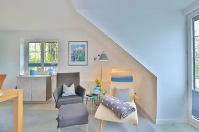 Ein Sitzbereich in der Unterkunft Haus am Falkenweg Haus am Falkenweg Appartement 4 Aalto 2