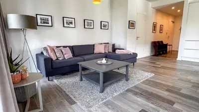 Ein Sitzbereich in der Unterkunft Haus Meeresbrise Haus Meeresbrise Appartement 19