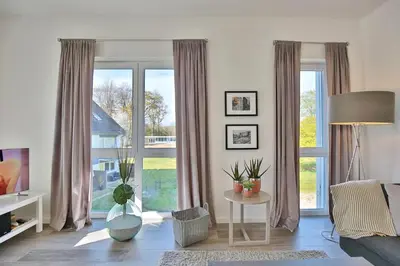 Ein Sitzbereich in der Unterkunft Haus Meeresbrise Haus Meeresbrise Appartement 19
