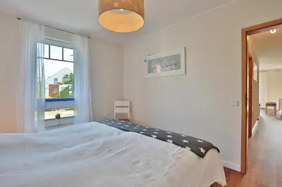 Ein Bett oder Betten in einem Zimmer der Unterkunft Feriendomizil am Konsulweg Feriendomizil am Konsulweg Appartement 6