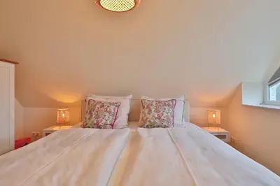 Ein Bett oder Betten in einem Zimmer der Unterkunft Residenz am Kurpark Residenz am Kurpark Appartement 8