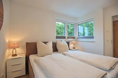 Ein Bett oder Betten in einem Zimmer der Unterkunft Bude 37 Appartement 5 Conny