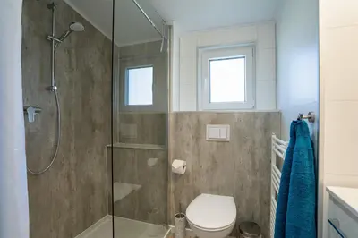 Ein Badezimmer in der Unterkunft Ferienhaus 