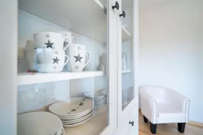 Ein Sitzbereich in der Unterkunft Cottage am Meer