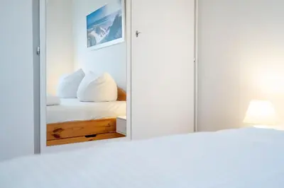 Ein Bett oder Betten in einem Zimmer der Unterkunft Cottage am Meer