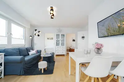 Ein Sitzbereich in der Unterkunft Cottage am Meer