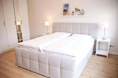 Ein Bett oder Betten in einem Zimmer der Unterkunft Ferienwohnung Frieda