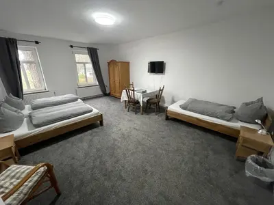 Ein Bett oder Betten in einem Zimmer der Unterkunft Landgasthof Witten