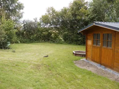 Ein Garten an der Unterkunft Ferienhaus Jantzen