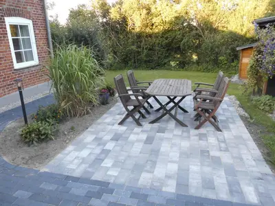 Ein Garten an der Unterkunft Ferienhaus Jantzen