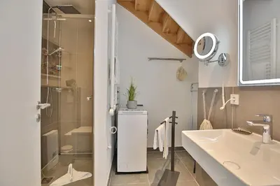 Ein Badezimmer in der Unterkunft View 91 Ferienwohnung Dünenblick App 1
