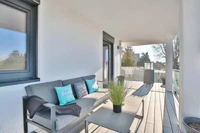 Ein Sitzbereich in der Unterkunft View 91 Ferienwohnung Dünenblick App 1