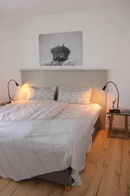 Ein Bett oder Betten in einem Zimmer der Unterkunft Fine Home