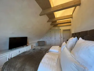 Ein Bett oder Betten in einem Zimmer der Unterkunft Landhüüs Oeverdiek - Luxus am Golfplatz