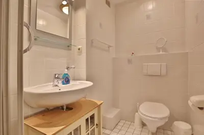 Ein Badezimmer in der Unterkunft Haus Miramar TREF Appartement 12