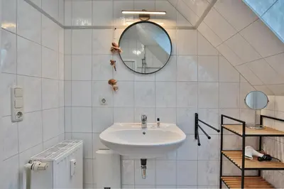Ein Badezimmer in der Unterkunft Maison Baltique Niendorf Ferienwohnung 