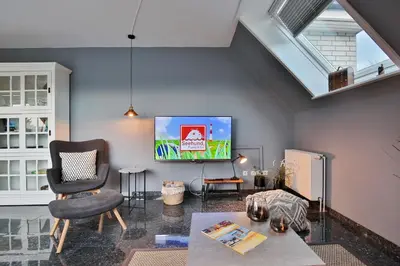 TV/Unterhaltungsangebot in der Unterkunft Maison Baltique Niendorf Ferienwohnung 