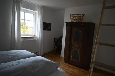 Ein Bett oder Betten in einem Zimmer der Unterkunft Hyggelig in Holstein