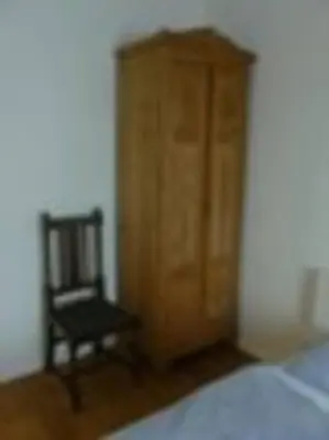 Ein Bett oder Betten in einem Zimmer der Unterkunft Schrotboden