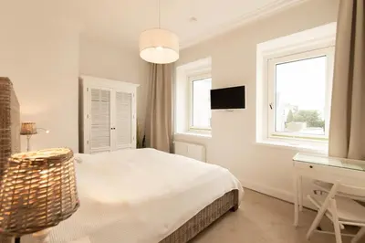 Ein Bett oder Betten in einem Zimmer der Unterkunft Ferienwohnung Ankerplatz