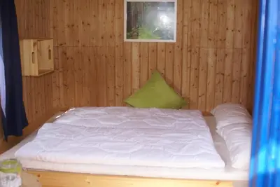 Ein Bett oder Betten in einem Zimmer der Unterkunft Wakenitz-Camp